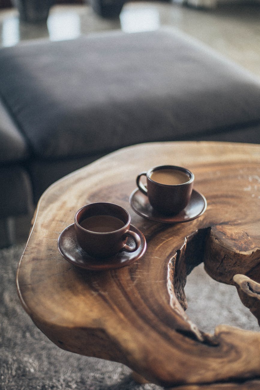 two brown ceramic mugs