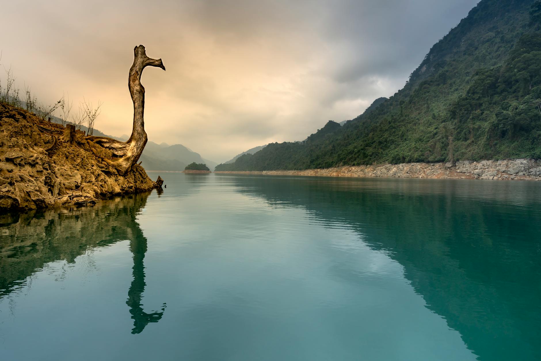 mountain near body of water